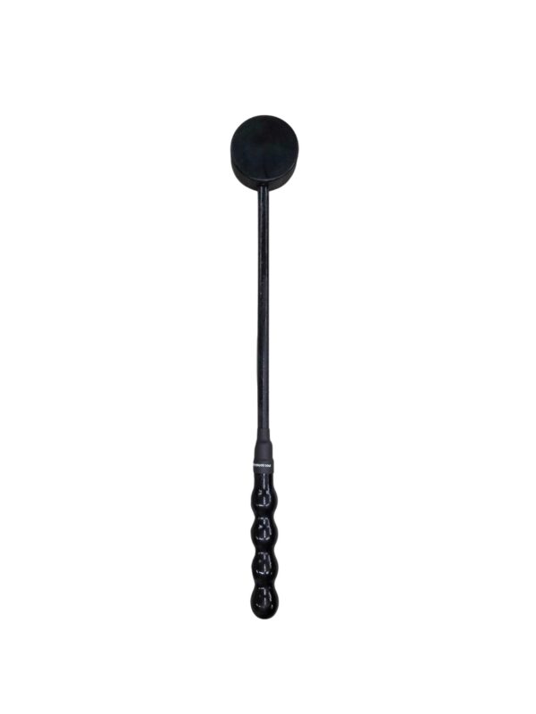 Black bdsm toy for impact play, with a puck on top